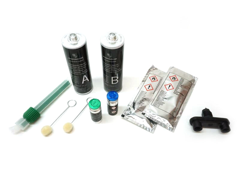 Genuine Porsche window adhesive set with applicator for secure car window installation or repair.