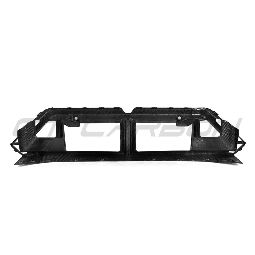 BMW G90 M5 and G99 M5 Touring 2024 carbon fiber front bumper middle trim by CT Carbon, showing detailed textured design.