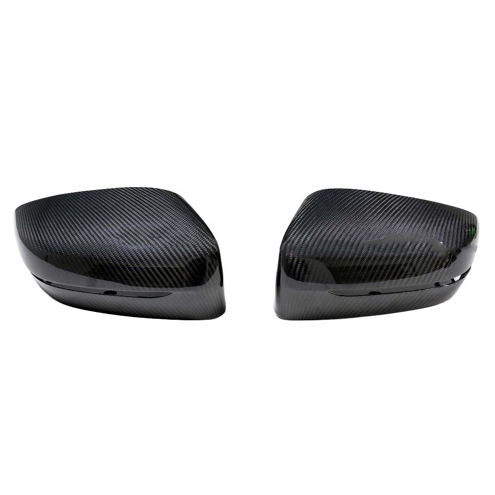 BMW G42 2 Series 2022+ LHD dry carbon fibre mirror cover replacements by CT Carbon, showing sleek, textured mirror side covers.