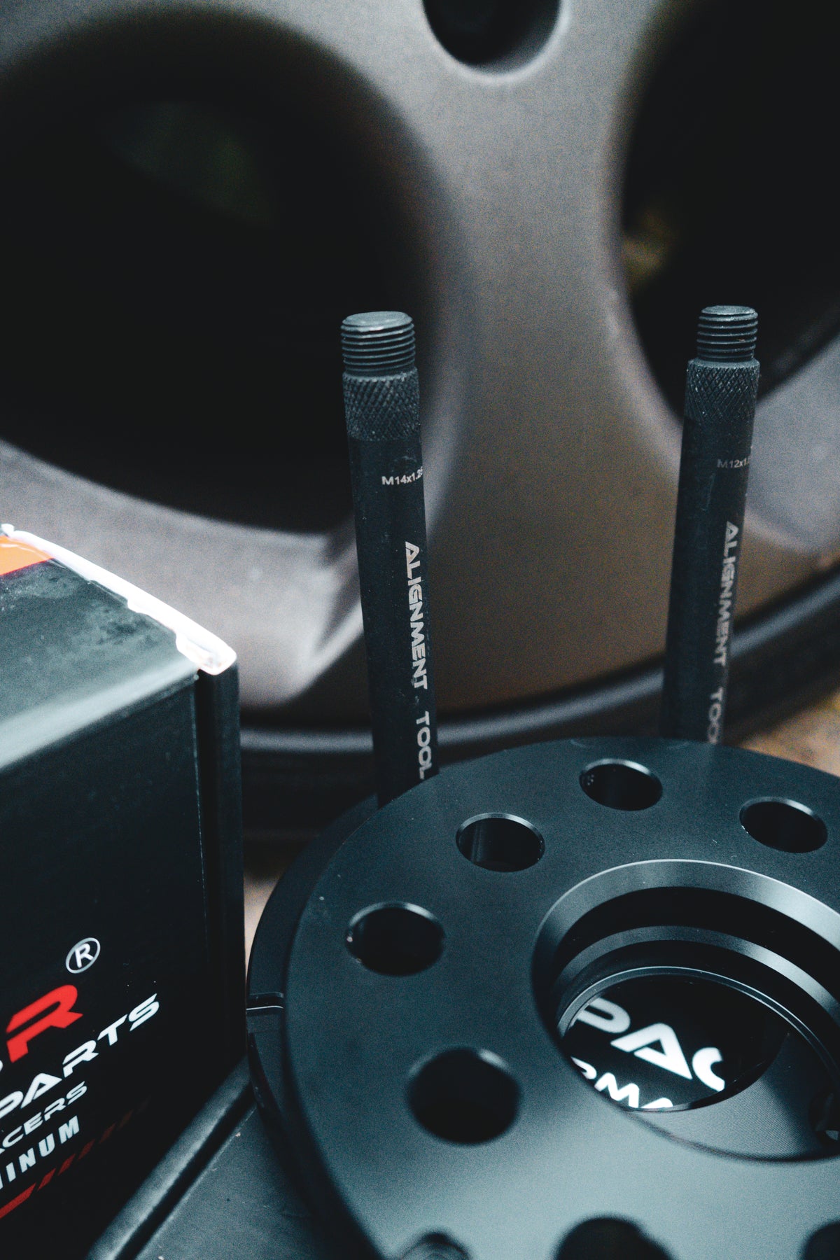 Space-R wheel spacers for Audi S6, S5, S4, RS6, RS5, RS4 vehicles, showing the metal spacers mounted on wheels.