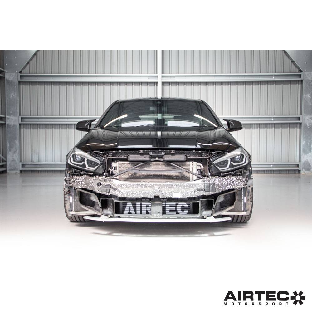 Airtec Motorsport intercooler for BMW M135i F40, showcasing the high-performance intercooler with core and end tanks.