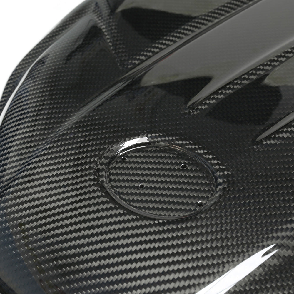 CT Carbon Toyota Supra A90 3.0T B58 carbon fiber engine cover, close-up view showing sleek design and textured finish.