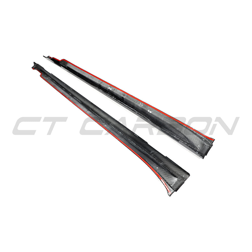 CT Carbon Porsche Taycan 2020-2024 carbon fiber side skirts installed on the vehicle, showcasing sleek aerodynamic design.