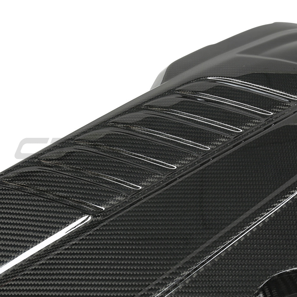 CT Carbon Toyota Supra A90 3.0T B58 carbon fiber engine cover accessory showing sleek custom design on engine.
