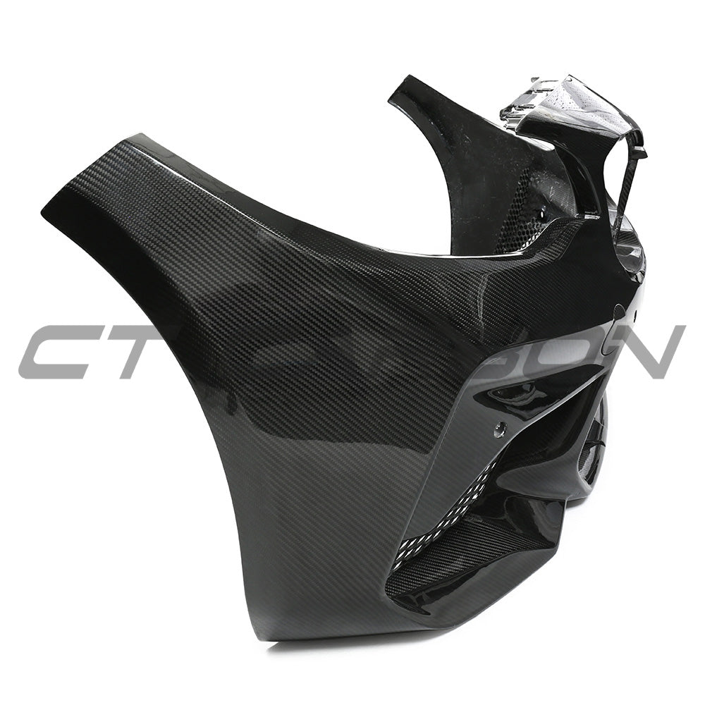 BMW F87 M2C carbon pre-preg fibre front bumper by CT Carbon, showcasing lightweight, aerodynamic design with detailed carbon fibre finish.