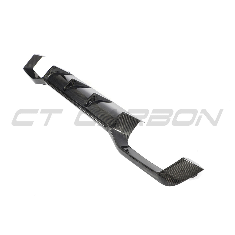 BMW G02 X4 and F98 X4M LCI 2022-2025 CT Carbon carbon fibre diffuser installed on the rear of the vehicle.
