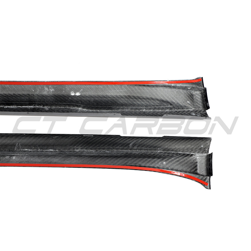 CT Carbon Porsche Taycan 2020-2024 carbon fiber side skirts installed on the vehicle, showcasing sleek aerodynamic design.