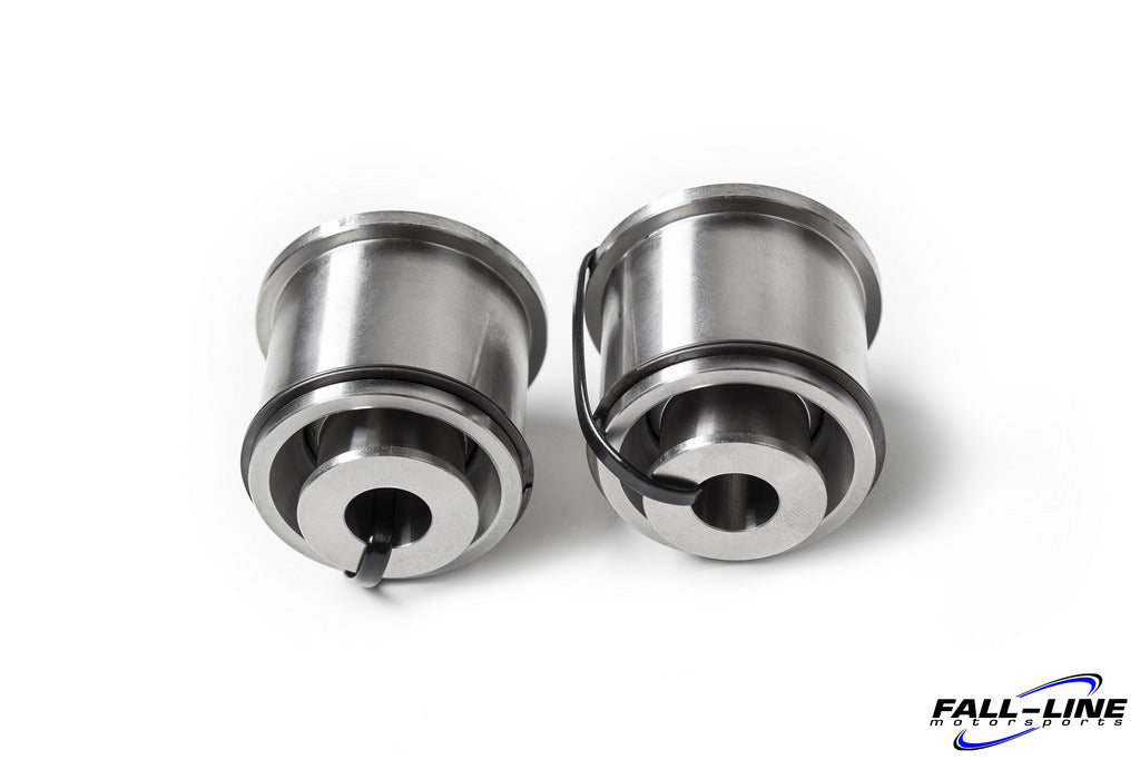 Fall Line Motorsports G8x/F8x M2 M3 M4 rear upper control arm bearing set with black bushings on a vehicle suspension component.