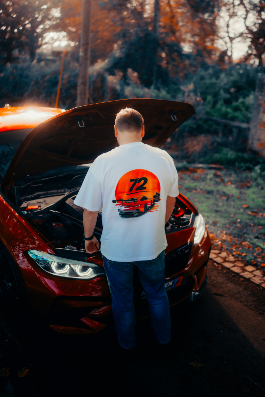 Nineteen72 Performance Flat Six Sunset T-Shirt featuring a vibrant sunset graphic on a casual cotton T-shirt.