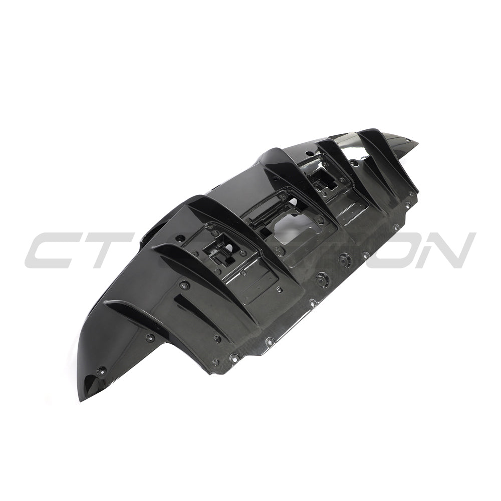CT Carbon Ferrari F8 2019-2023 carbon fiber diffuser showing sleek aerodynamic design and textured carbon fiber finish.