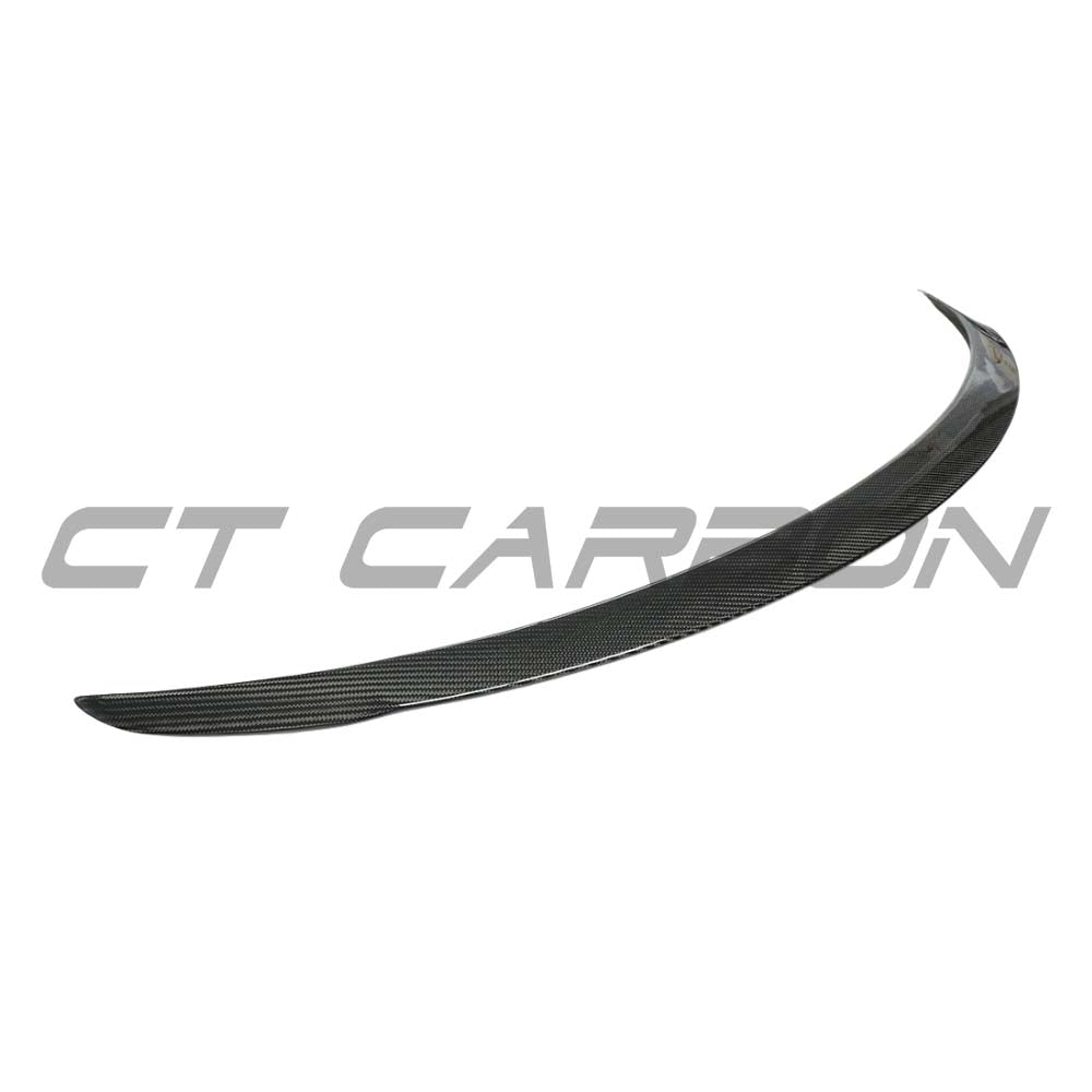 Tesla Model Y 2025+ facelift dry carbon spoiler by CT Carbon installed on the rear of the vehicle.