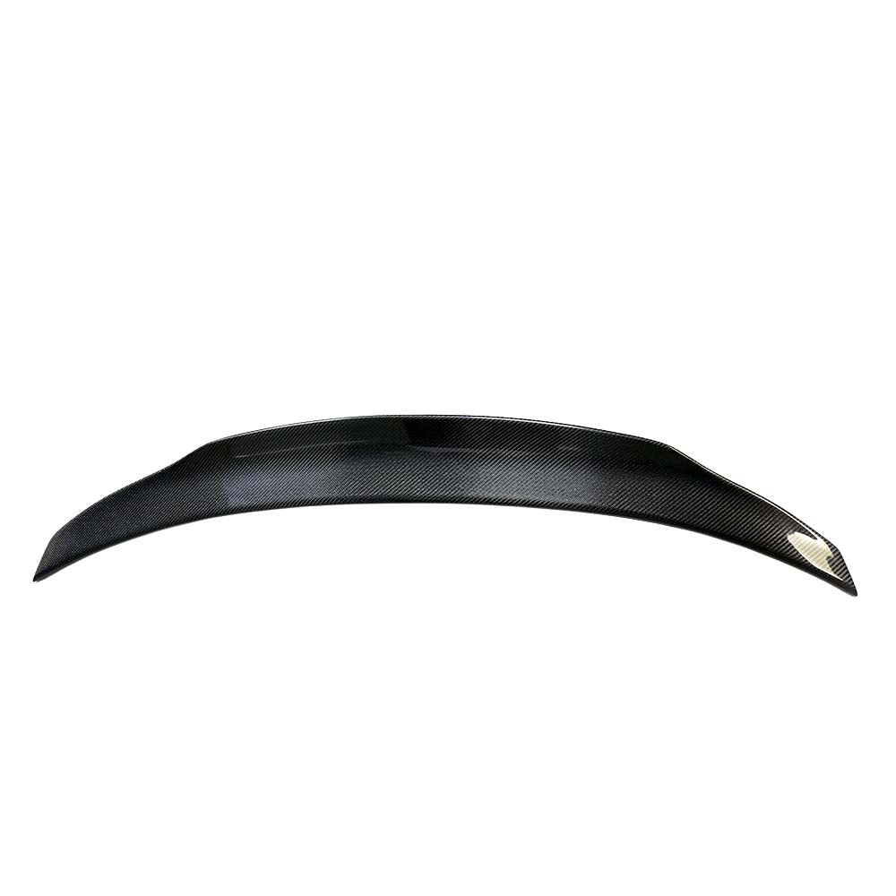 Mercedes C-Class W206 saloon carbon fibre spoiler by CT Carbon, showcasing the sleek aerodynamic design on the car's rear.