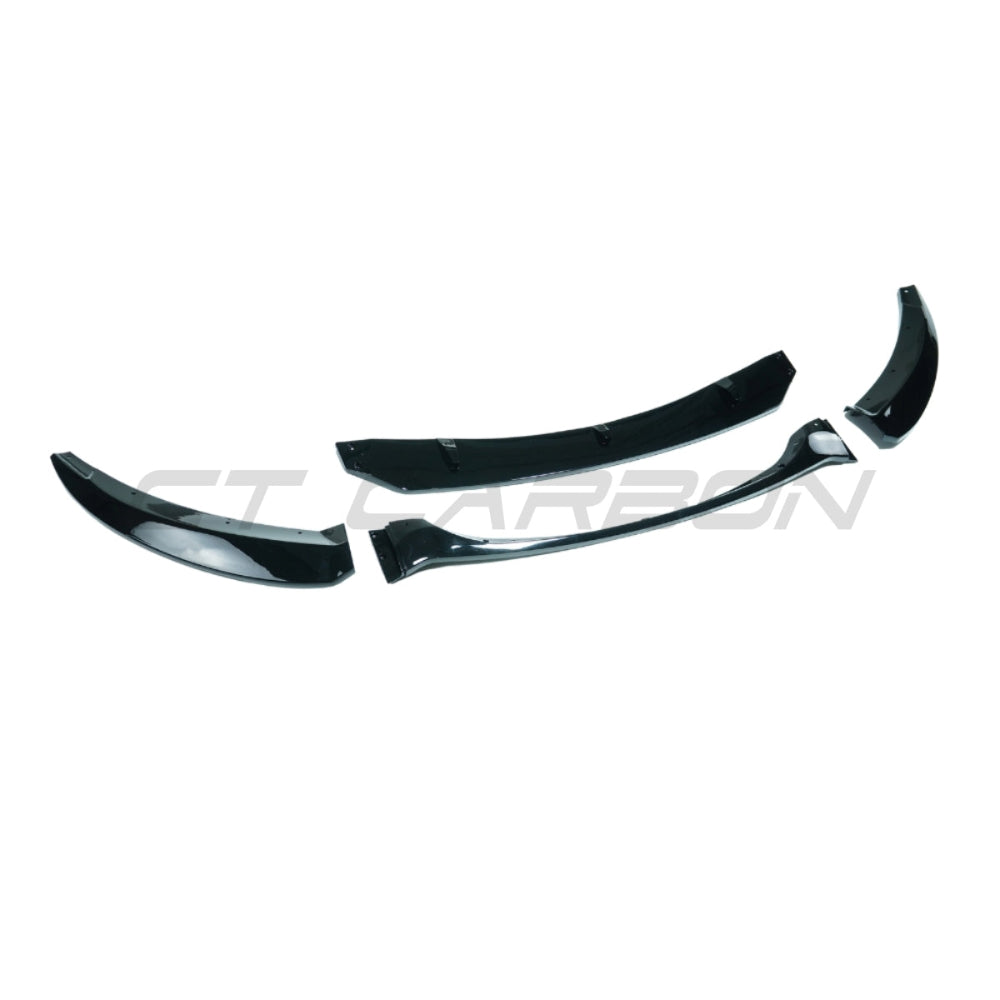 BMW E82/E88 1 Series 2007-2013 LCI gloss black splitter by CT Carbon, showing the sleek aerodynamic splitter attached to the front bumper.