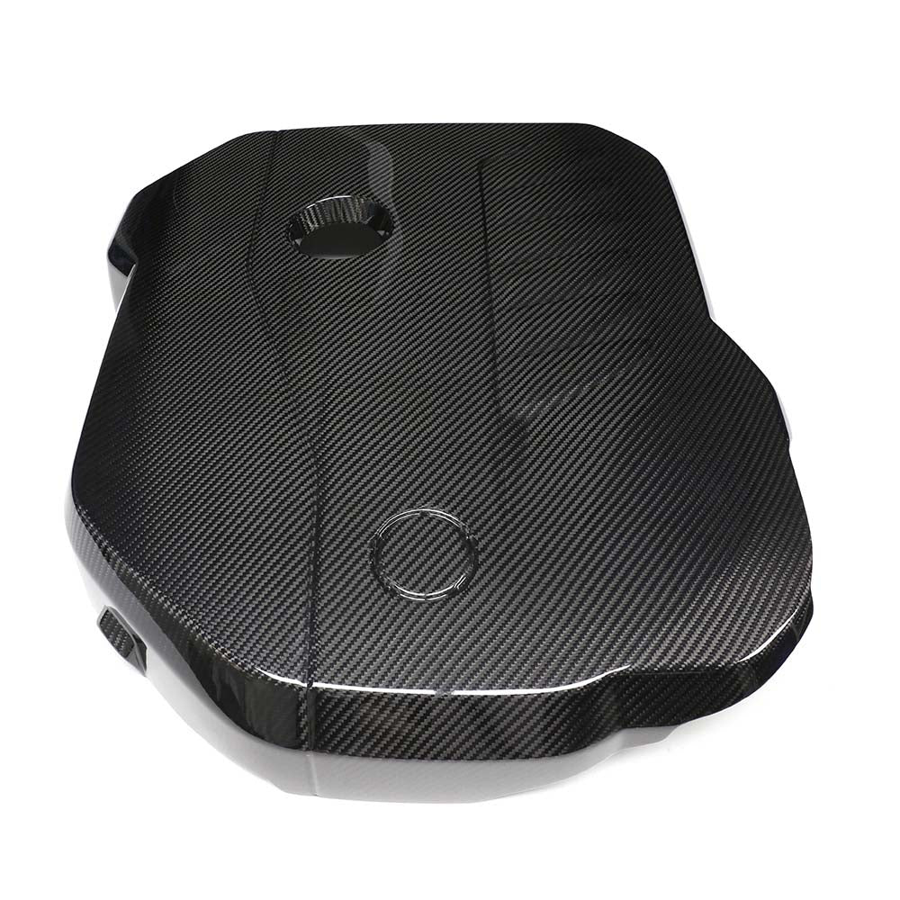 BMW G42 2 Series M240i 2022+ dry carbon fiber engine cover by CT Carbon, showing sleek, textured carbon fiber surface.