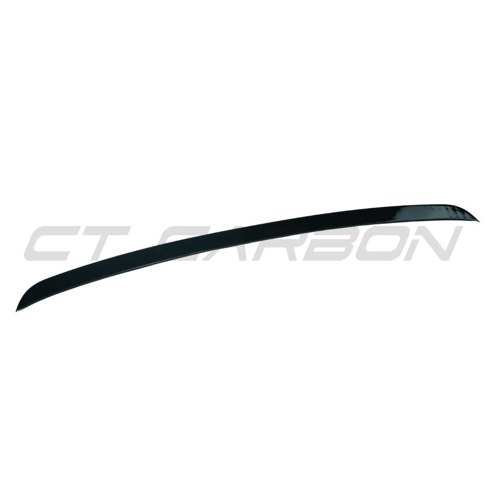 Gloss black carbon spoiler for Volkswagen Golf R, GTD, GTI MK7/7.5 2014-2020 by CT Carbon, shown on car's rear.