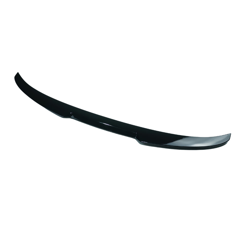 BMW 5 Series F10 2011-2017 CT Carbon gloss black spoiler, sleek aerodynamic car accessory on a black vehicle.