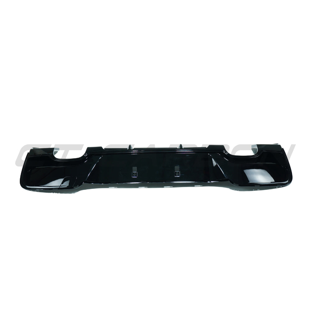 BMW 1 Series F20/F21 2012-2014 pre-LCI gloss black diffuser with quad tips, by CT Carbon, showing the rear bumper and diffuser details.