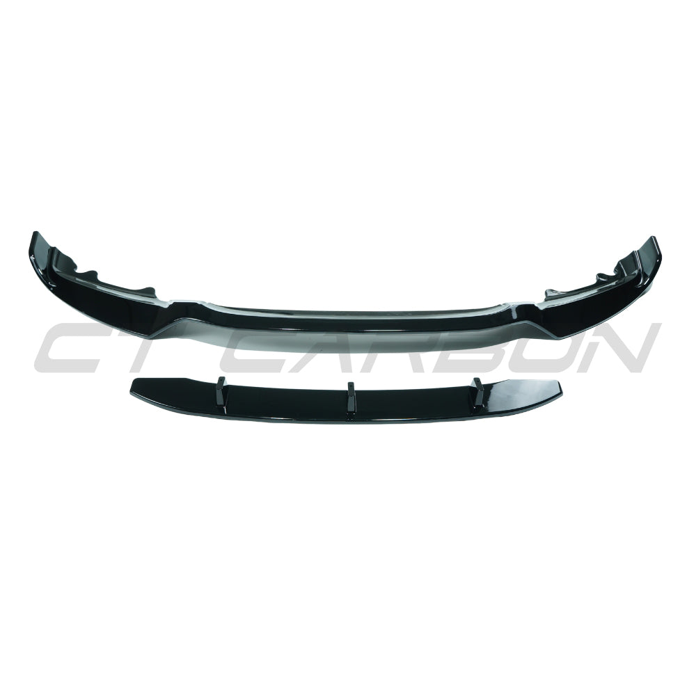BMW X6 F16 2014-2018 CT Carbon gloss black splitter installed on front bumper, highlighting sleek aerodynamic design.