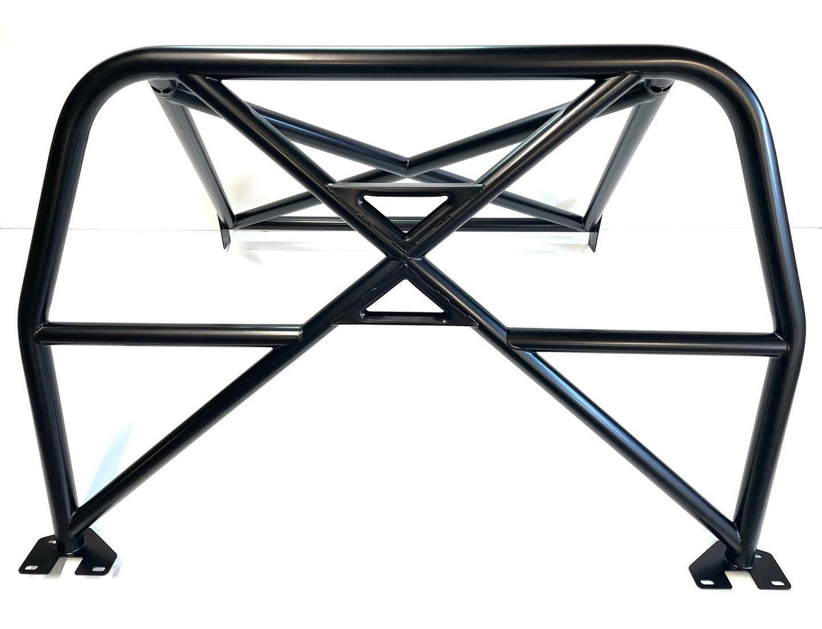 PINNACLE M4 GTS Style T45 half roll cage installed in a car, showcasing its tubular steel structure and mounting points for safety.