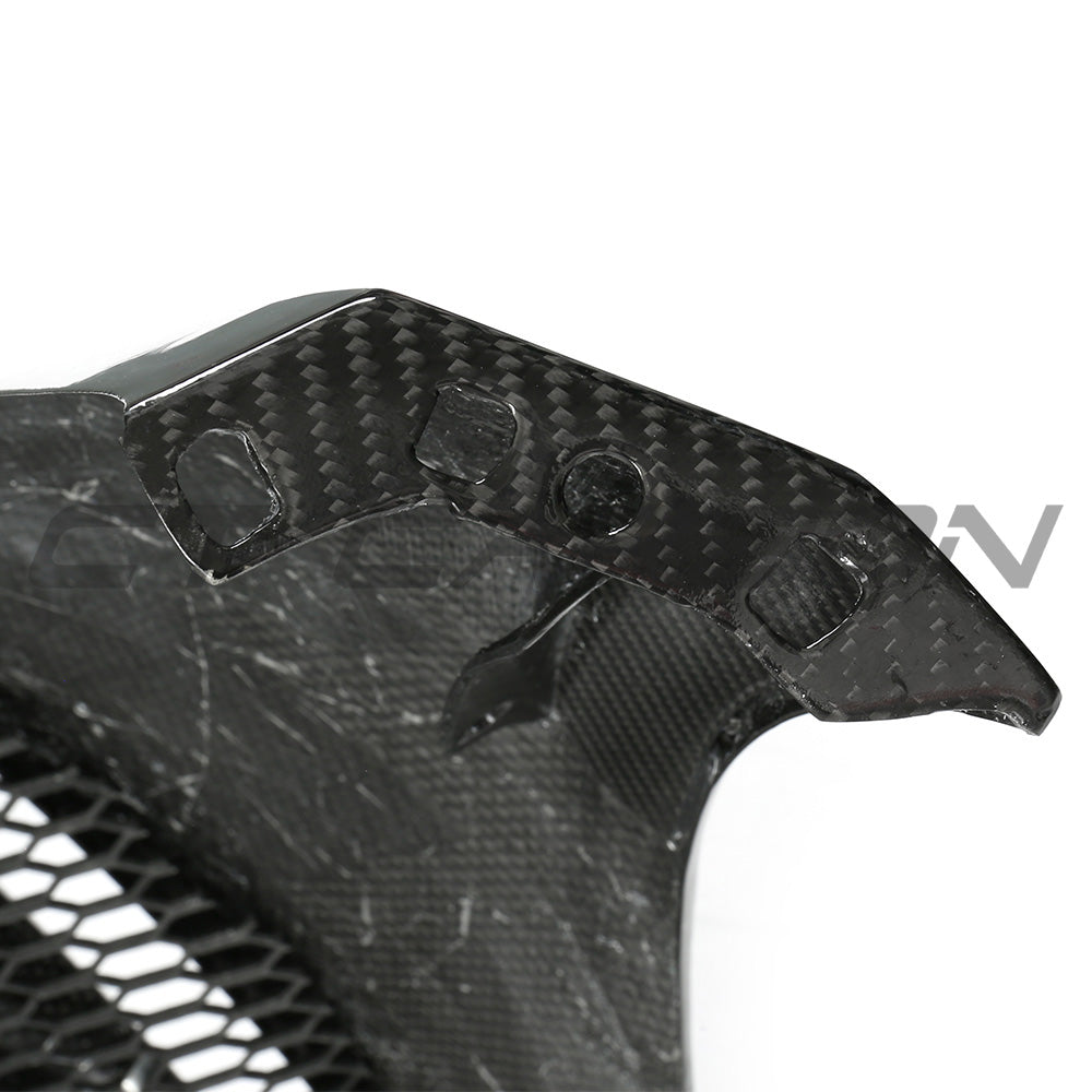 BMW F87 M2C carbon pre-preg fibre front bumper by CT Carbon, showcasing sleek, lightweight aerodynamic design.