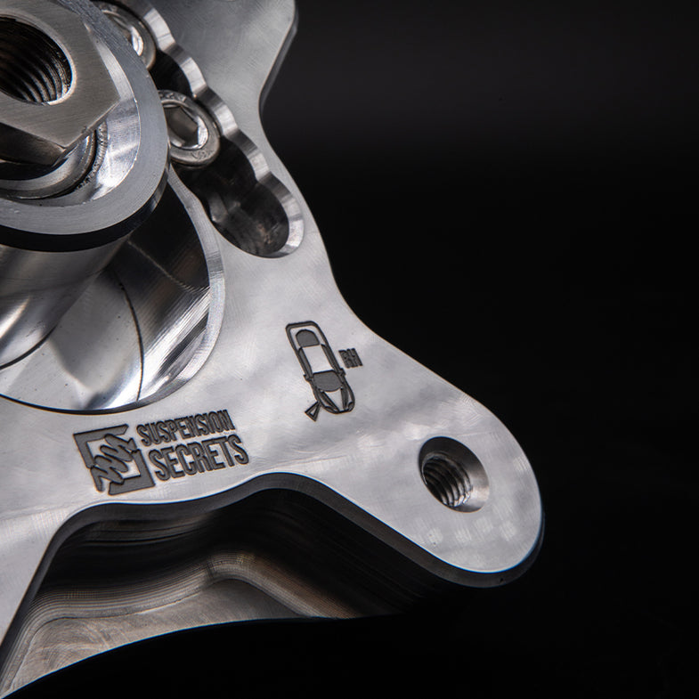 Suspension Secrets BMW G87 M2 camber and caster plates kinematics kit with adjustable plates and mounting hardware.