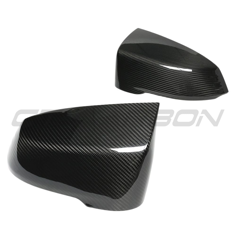 BMW X1 U11 2023+ carbon fibre mirror accessories by CT Carbon, showing sleek, lightweight mirror covers on the vehicle.