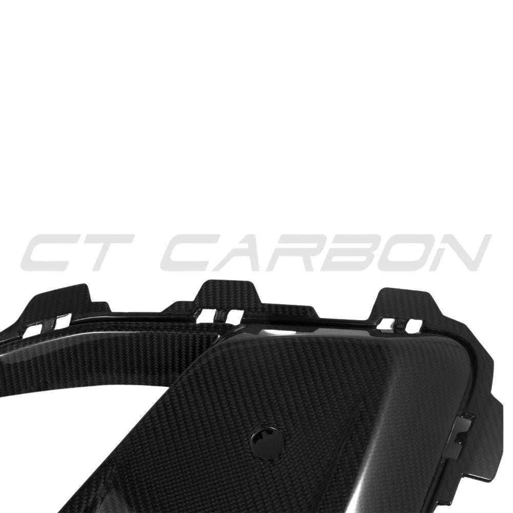 BMW X5M LCI 2023+ carbon fibre front bumper trim accessory by CT Carbon, showing detailed close-up of the sleek, lightweight design.