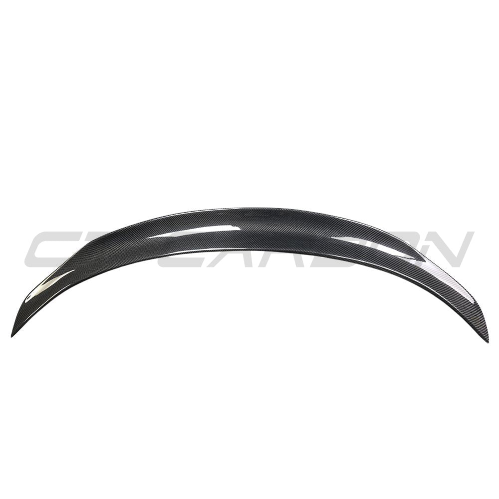 Tesla Model 3 2017-2023 CT Carbon V10 carbon fiber spoiler mounted on the rear of the vehicle.