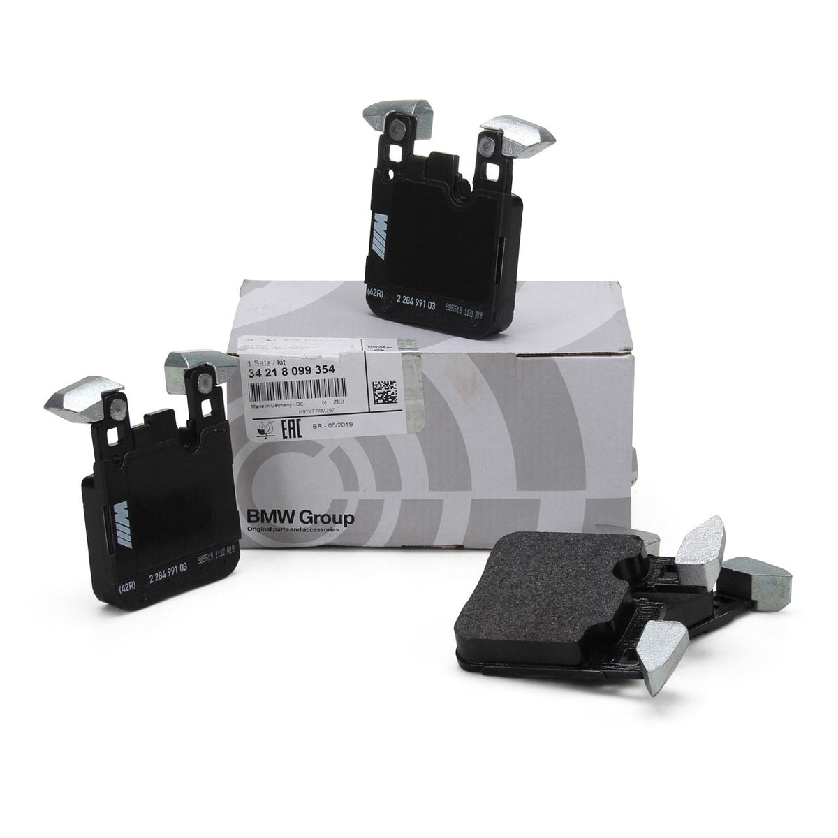 Genuine BMW F8X rear brake pads for F80 M3, F82 M4, F83 M4, and F87 M2, showing the brake pad set and branding.