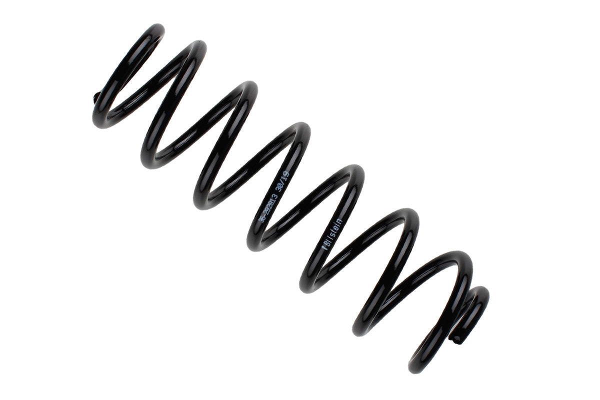 Bilstein B3 rear coil spring for Volkswagen Golf VII and Sportsvan, showing the black coil spring with coil and spring details.