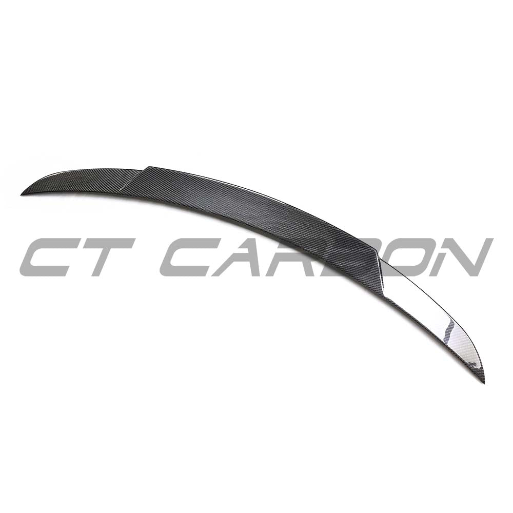 Mercedes C-Class W206 saloon carbon fibre spoiler by CT Carbon, showing the sleek, aerodynamic design and glossy finish.