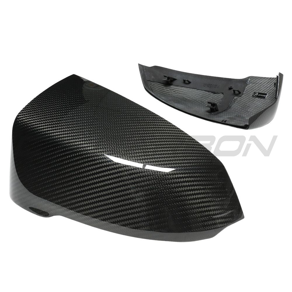 BMW X1 U11 2023+ CT Carbon fiber mirrors for car accessories, close-up of sleek, black carbon fiber side mirror covers.
