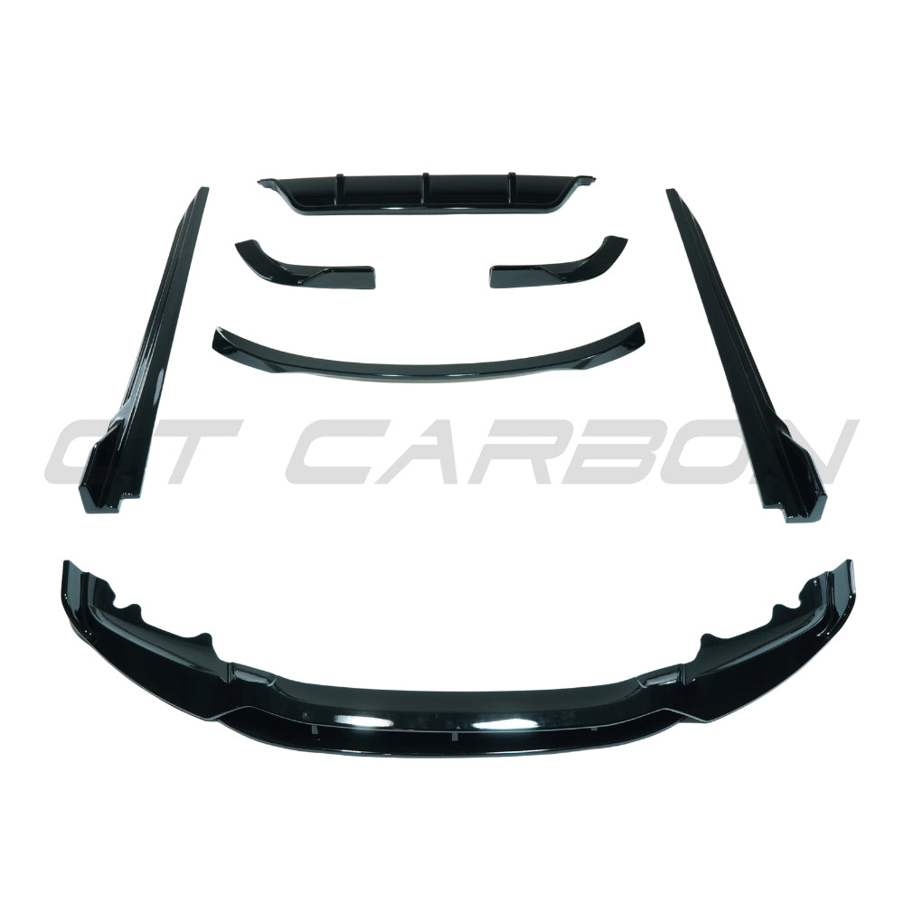 BMW X6 F16 2014-2018 CT Carbon gloss black kit installed on vehicle, showcasing sleek, aerodynamic exterior enhancements.