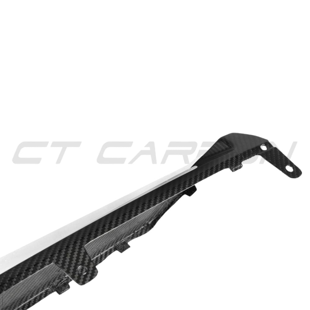 BMW 3 Series G20 G21 2022+ LCI carbon fiber diffuser with round tips by CT Carbon, showcasing sleek aerodynamic design.