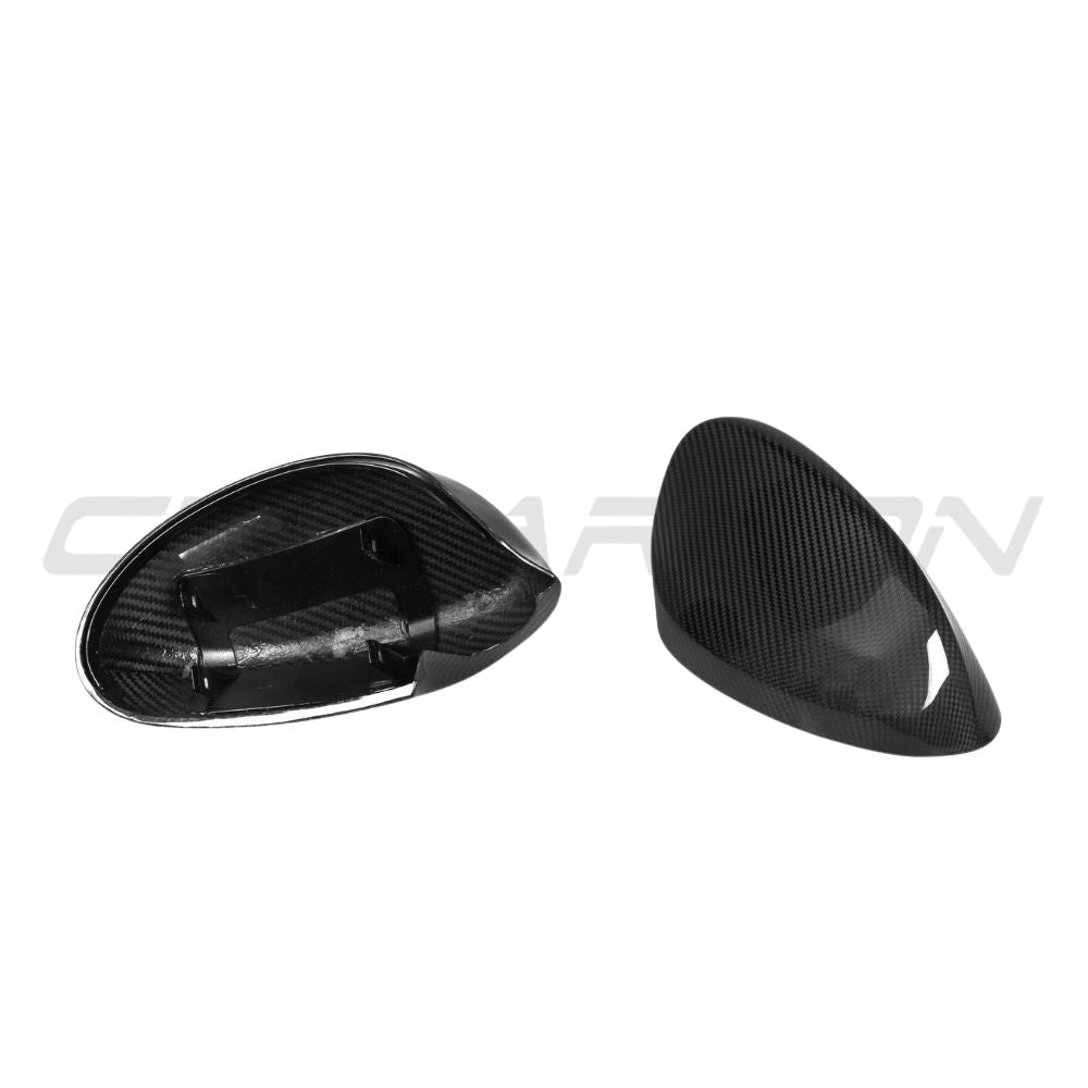 CT Carbon BMW 1 & 3 Series E82/E83/E87/E90/E91/E92/E93 carbon fiber mirrors, sleek design with reflective glass.