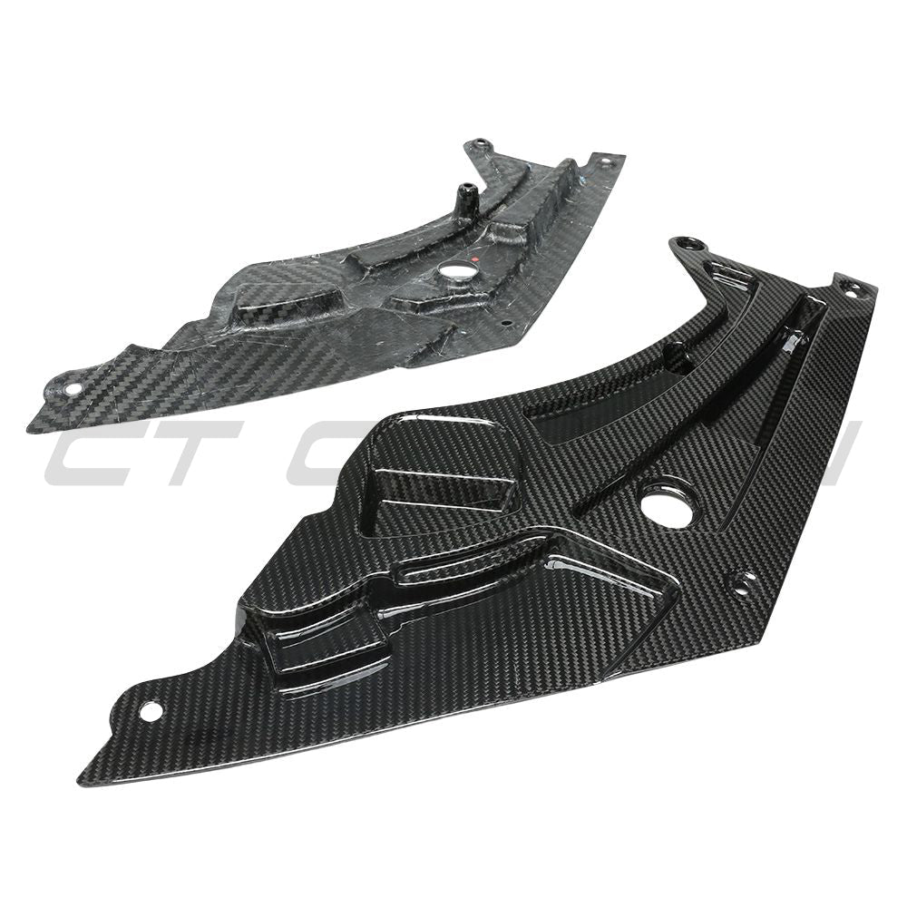 BMW M3 and M4 G80 G81 G82 G83 carbon fiber headlight cover by CT Carbon, close-up view showing sleek carbon fiber finish.