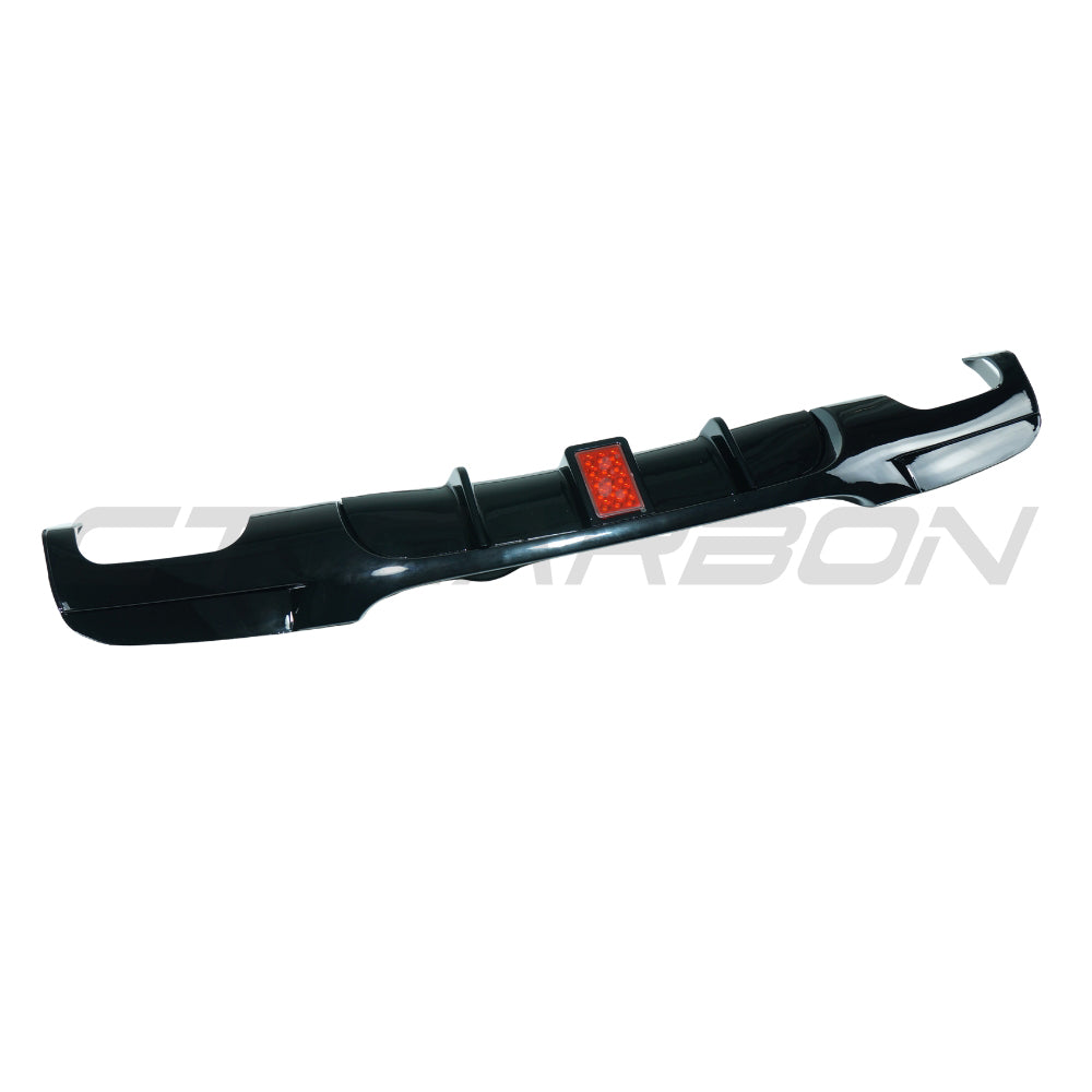BMW 3 Series E90/E91 2005-2011 GLOSS BLACK LED Diffuser with Quad Tip, made by CT Carbon, shown on the rear bumper.