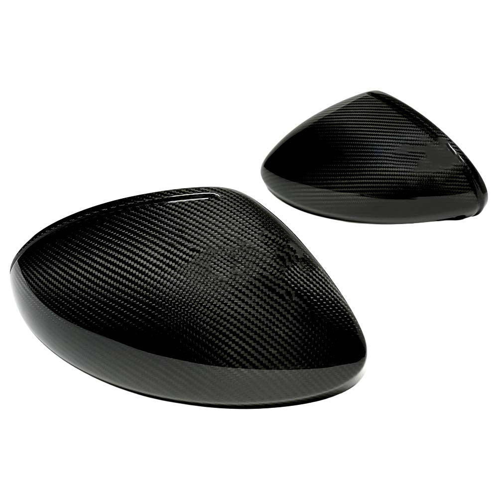LHD dry carbon mirror covers for Porsche 718 Cayman and Boxster 2019-2021 by CT Carbon, shown on side mirrors.