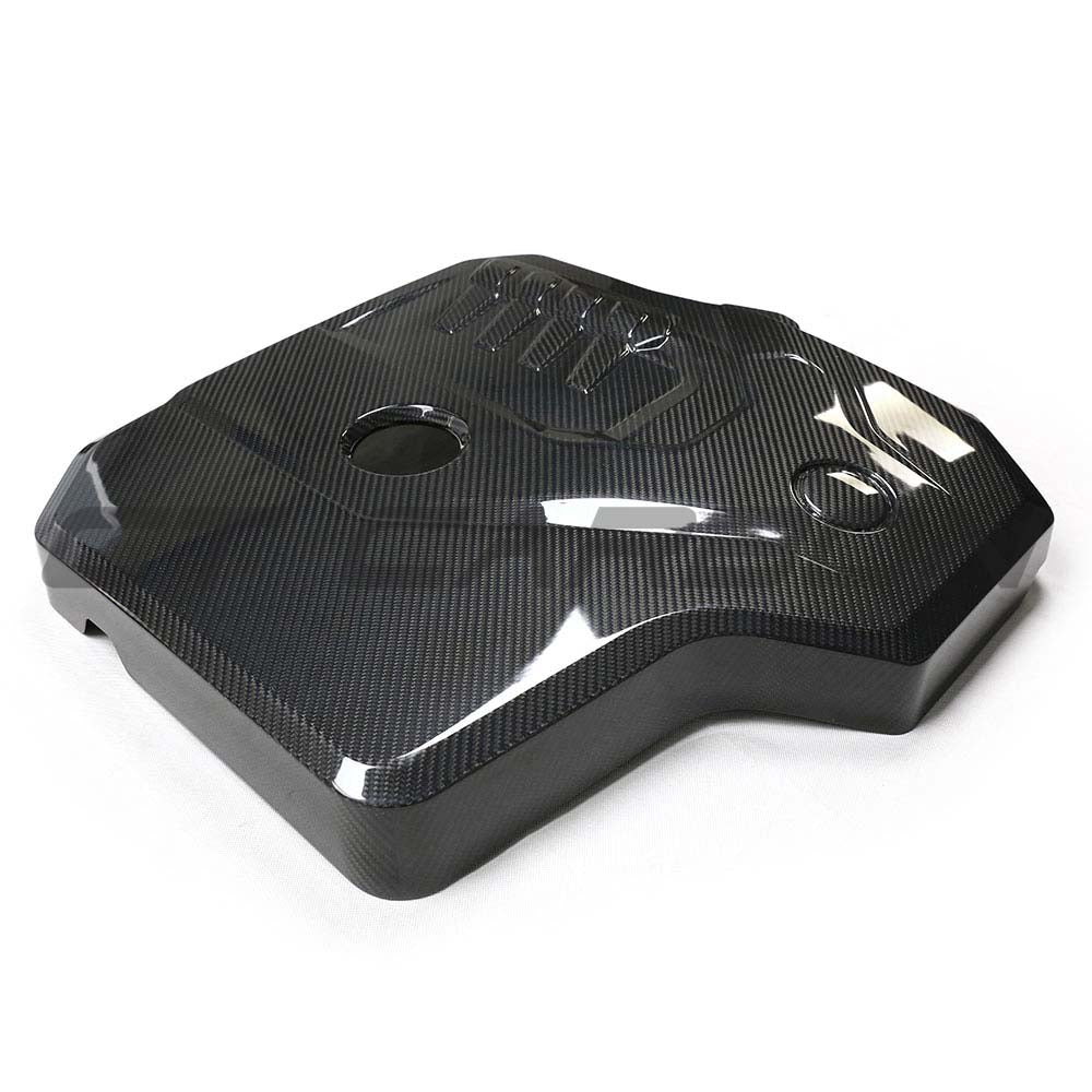 BMW G42 2 Series 2022+ dry carbon fiber engine cover by CT Carbon, showcasing its sleek, lightweight design and textured finish.