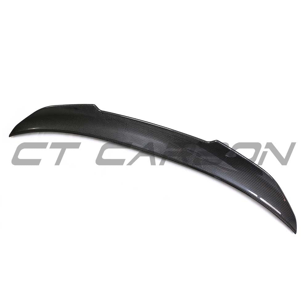 BMW F32 4 Series 2013-2020 CT Carbon V3 dry carbon spoiler mounted on the car's rear for aerodynamic enhancement.