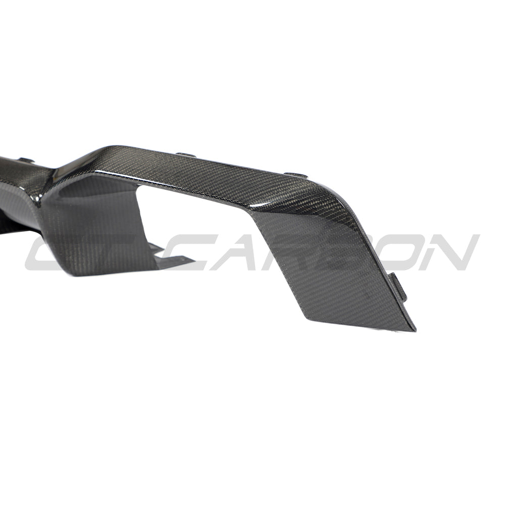 BMW G02 X4 and F98 X4M LCI 2022-2025 carbon fibre diffuser by CT Carbon, showing sleek black aerodynamic design and textured finish.