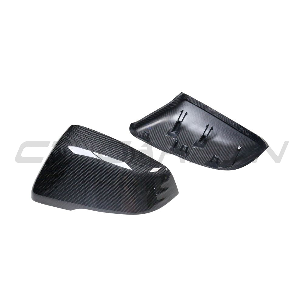 Toyota Supra A90 carbon fiber mirror accessories by CT Carbon, close-up of sleek, lightweight side mirrors with carbon fiber finish.