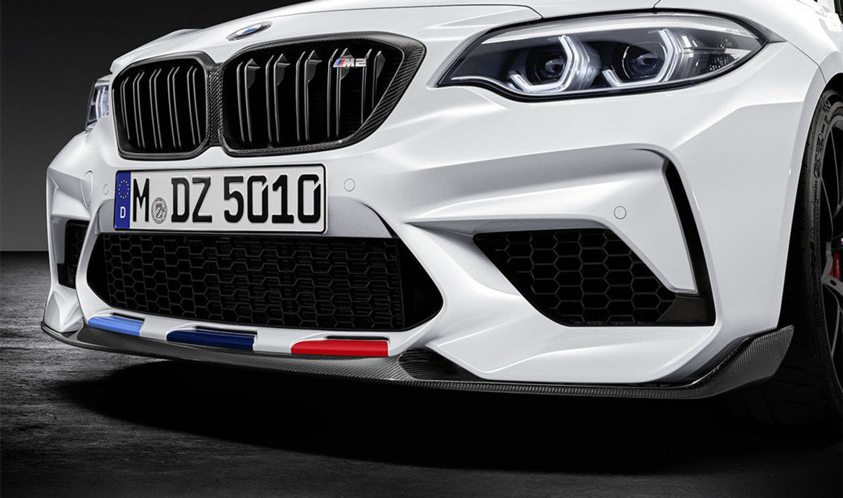 Genuine BMW M Performance F87 M2 Competition carbon front splitter attachment, aerodynamic car part for enhanced performance.