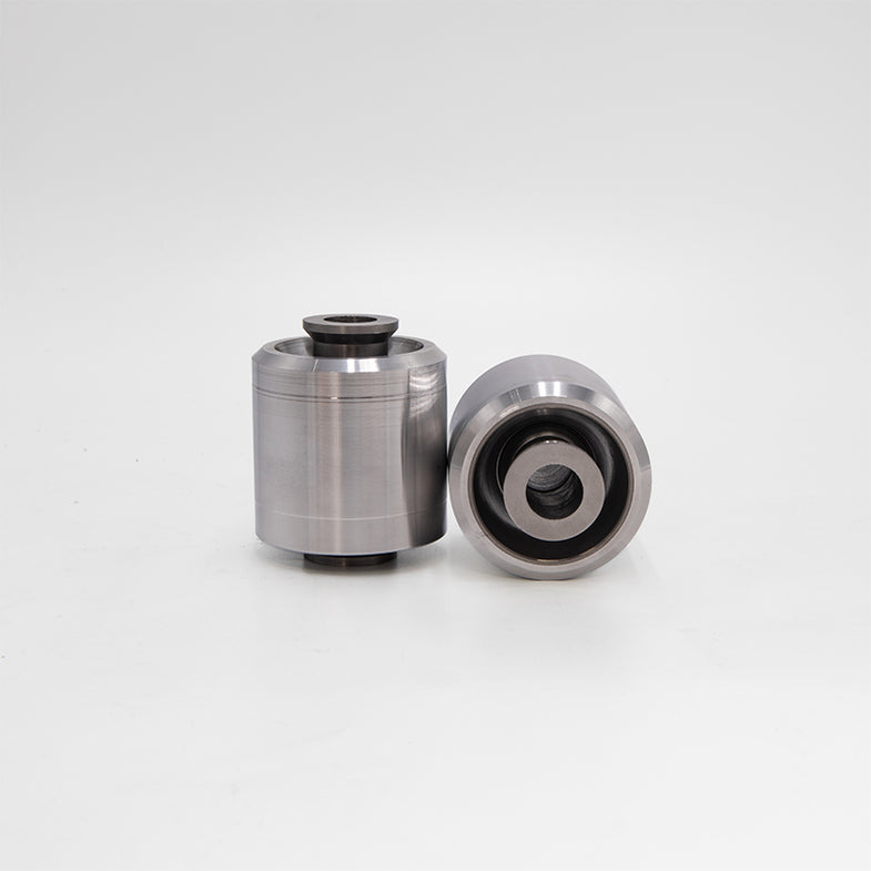 Suspension Secrets solid rear control arm bushes for BMW G87 M2, durable suspension linkage components in black.