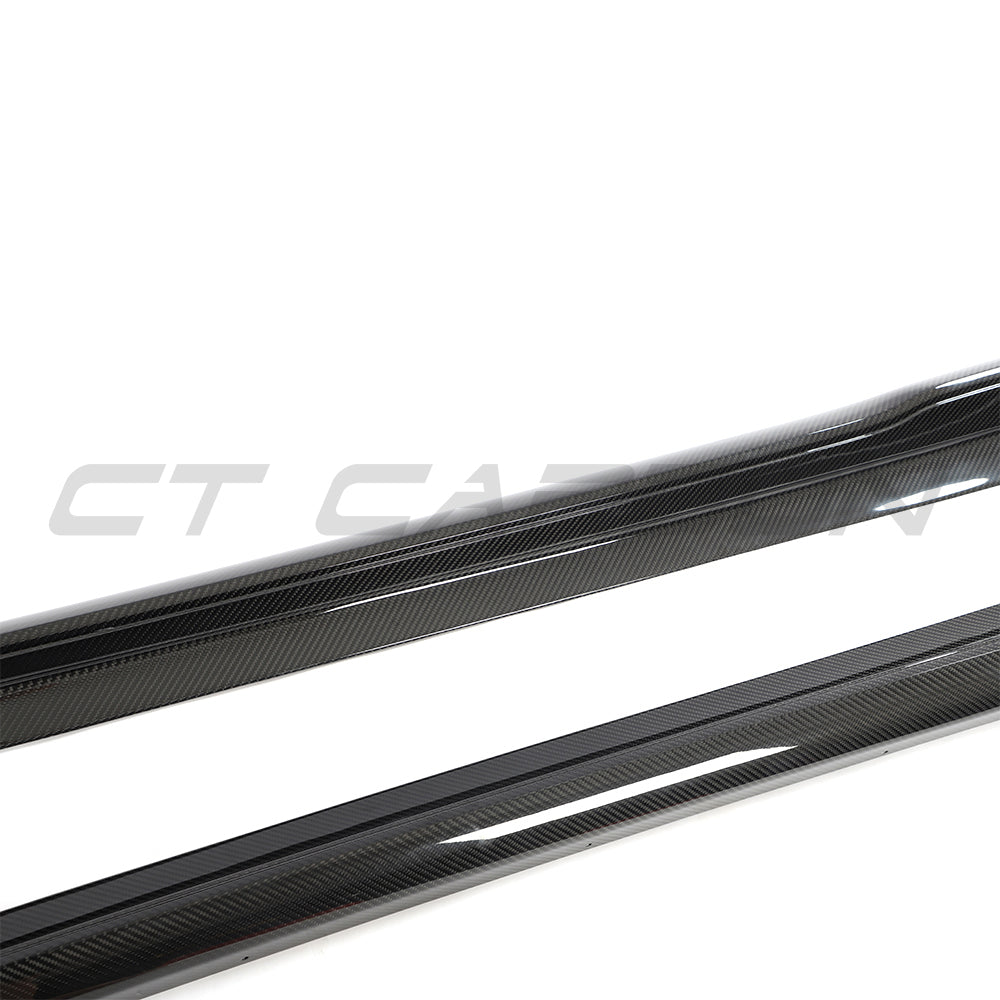 CT Carbon Porsche Taycan 2020-2024 carbon fiber side skirts installed on the vehicle, enhancing aerodynamics and sporty appearance.