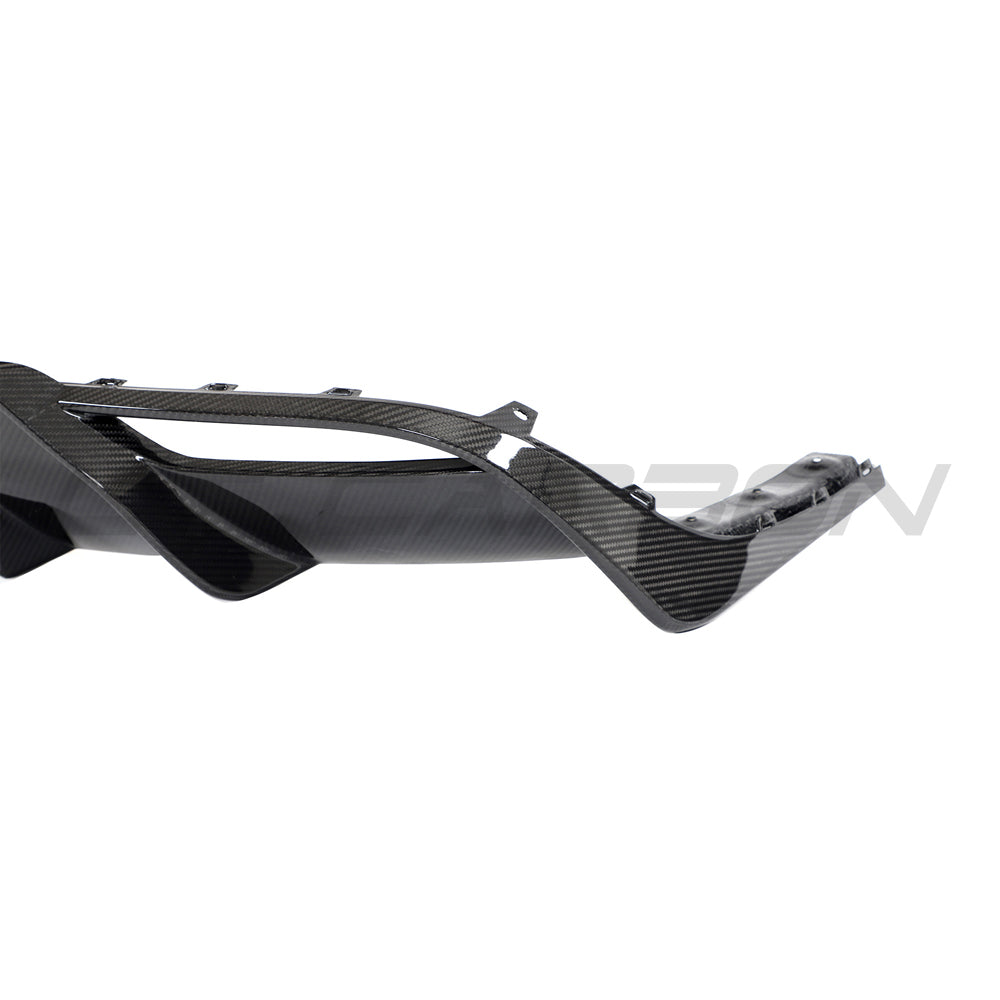 Carbon fiber diffuser for Tesla Model 3 Facelift 2023+ by CT Carbon, showing sleek, aerodynamic design on a modern electric car.