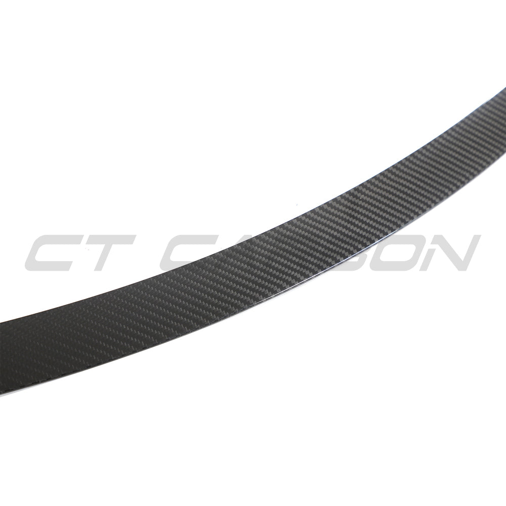 Tesla Model 3 Facelift 2023+ carbon fibre spoiler by CT Carbon, showing sleek aerodynamic design on the car's rear.