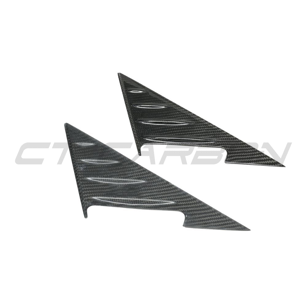 BMW G22 G23 G26 4 Series dry carbon fibre mirror pillar trim accessory by CT Carbon, showcasing sleek textured finish.
