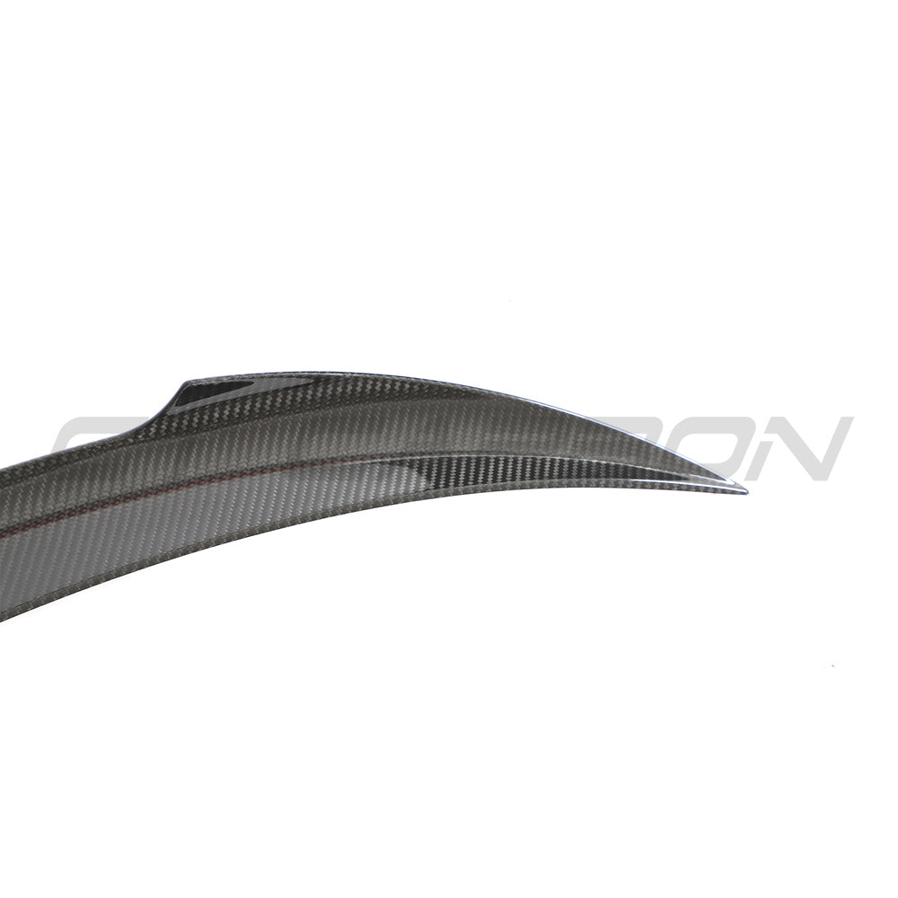 Tesla Model 3 Facelift 2023+ carbon fiber spoiler by CT Carbon, V2 style, showing the sleek, aerodynamic design on the car.