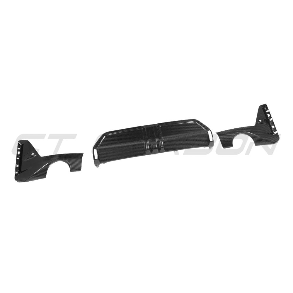 BMW 3 Series G20 G21 2022+ LCI carbon fiber diffuser with round tips by CT Carbon, shown on the rear of the vehicle.